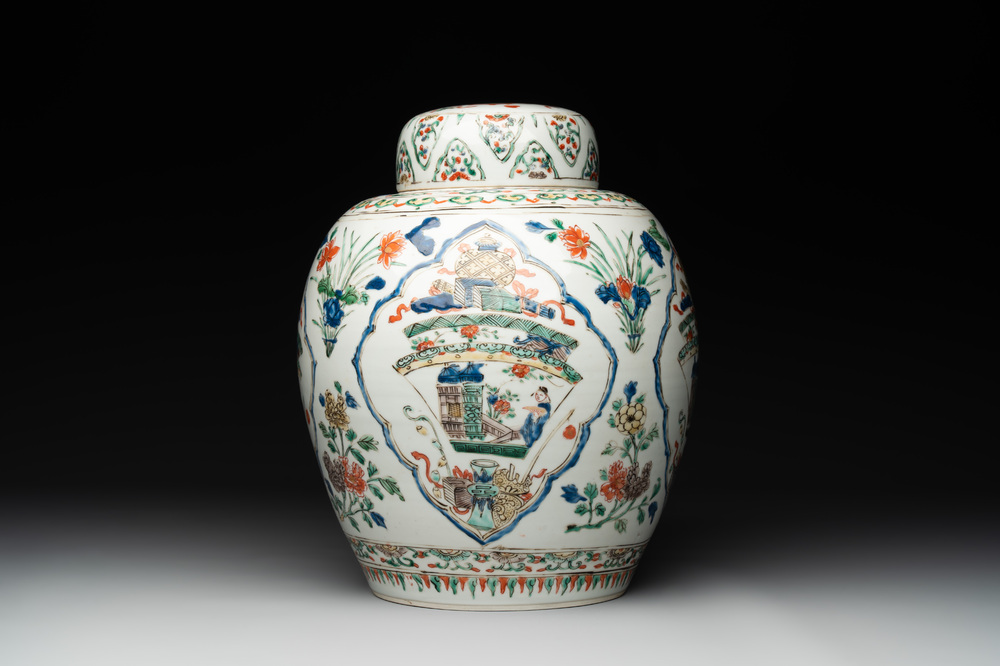 A Chinese famille verte 'figures and antiquities' jar and cover, Kangxi