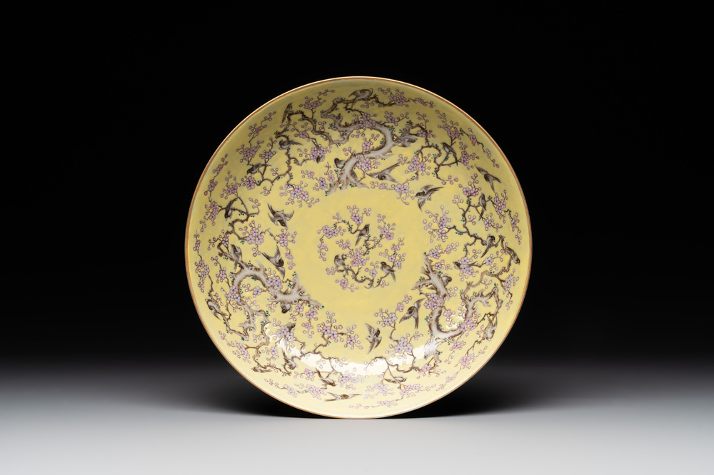 A Chinese yellow-ground famille rose 'magpie and plum tree' plate, Tongzhi mark and of the period