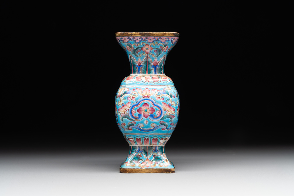 A Chinese Canton enamel 'gu' vase with floral design, Qianlong mark and of the period