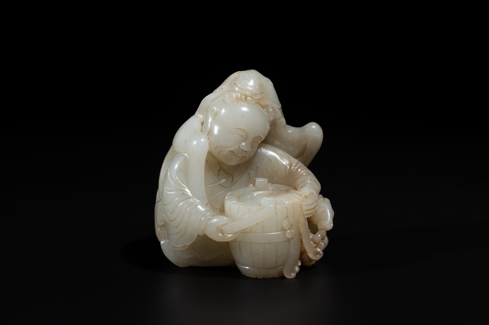 A Chinese white and russet jade 'Lu Ru Feng Qin 鹿乳奉親' carving, Qing