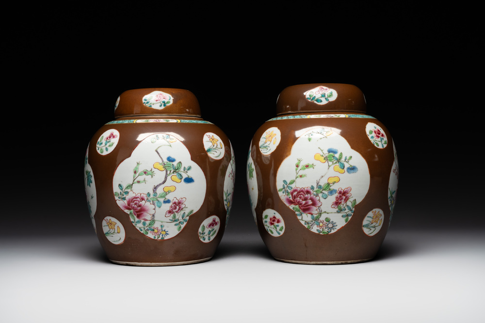 A pair of Chinese capucin-brown-ground famille rose covered jars with floral design, Yongzheng/Qianlong