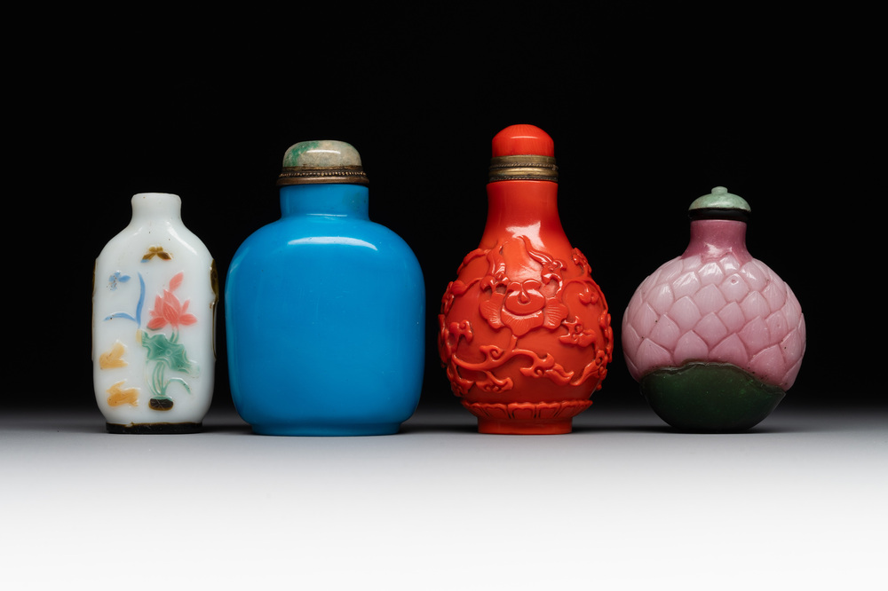 Four Chinese Peking glass snuff bottles, one with a Qianlong mark, 18/19th C.