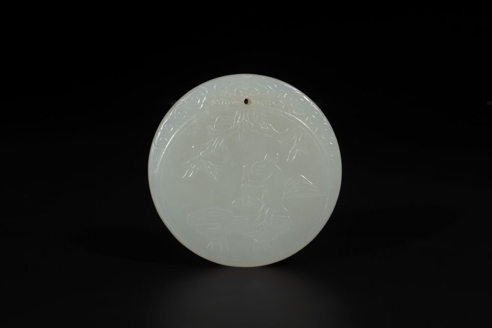 A Chinese white jade 'moon hare and rooster' plaque, Qing