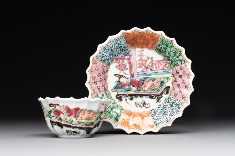 A Chinese famille rose cup and saucer with a reclined lady, Qianlong