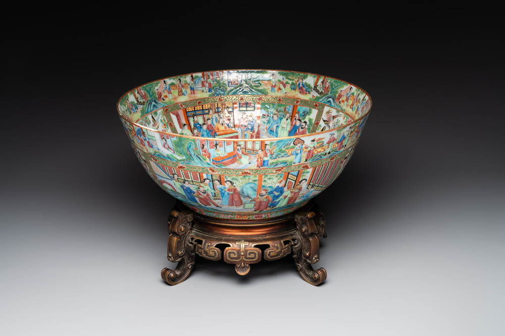 A large Chinese Canton famille rose bowl with a bronze stand, 19th C.