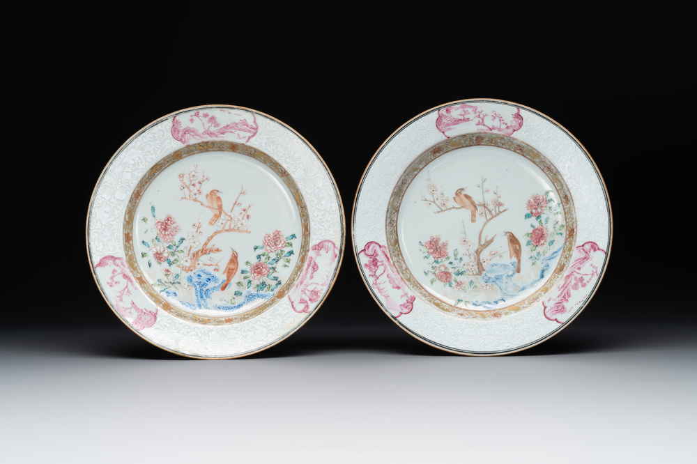 A pair of Chinese famille rose 'magpie and peony' plates with bianco-sopra-bianco rims, Yongzheng