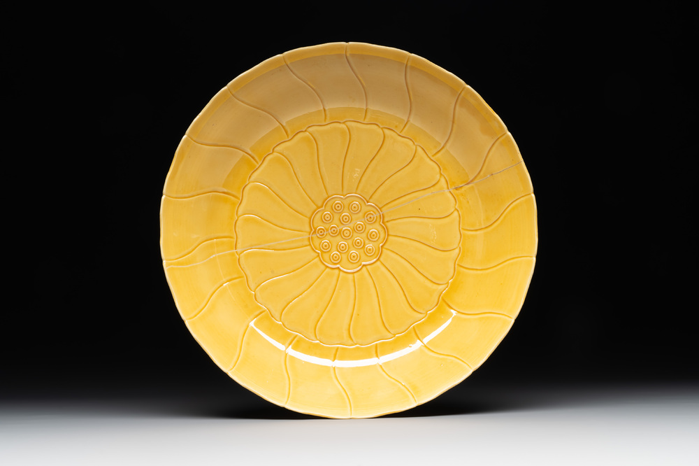 A Chinese yellow-glazed monochrome lotus-shaped dish, Yongzheng mark and of the period