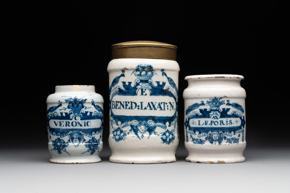 Three blue and white Dutch Delft albarelli, 18th C.