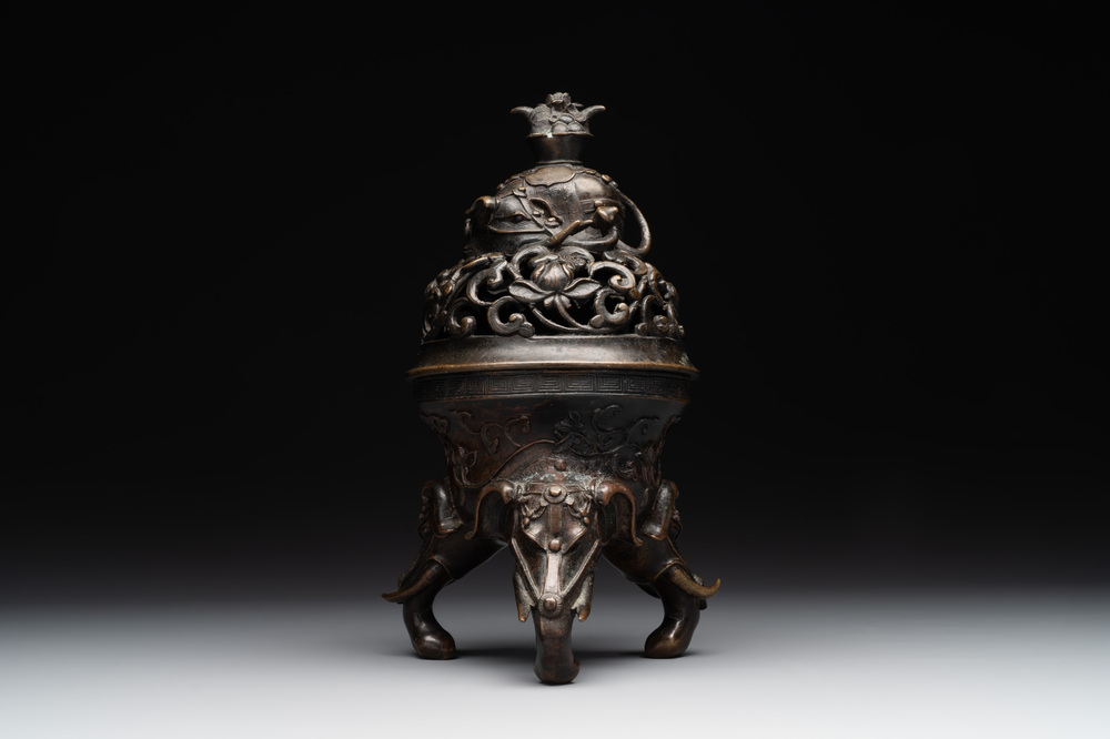 A fine Chinese tripod 'elephant' censer and cover, Ming