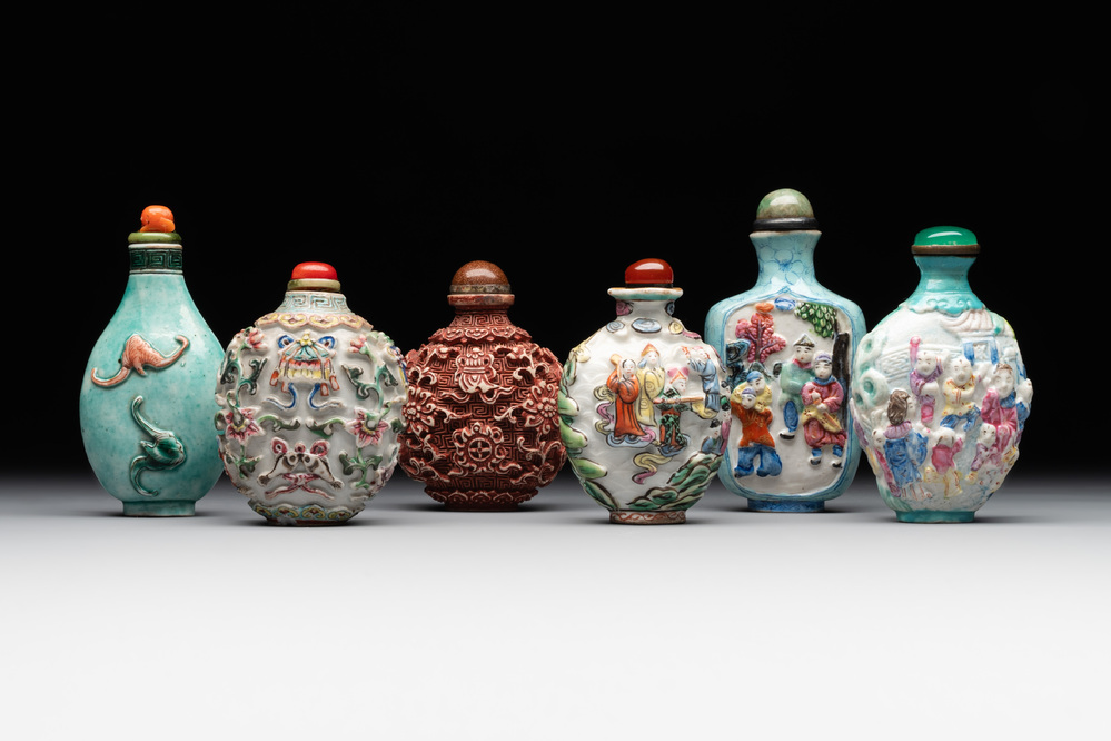 Six Chinese famille rose moulded snuff bottles, Qianlong mark, 19/20th C.