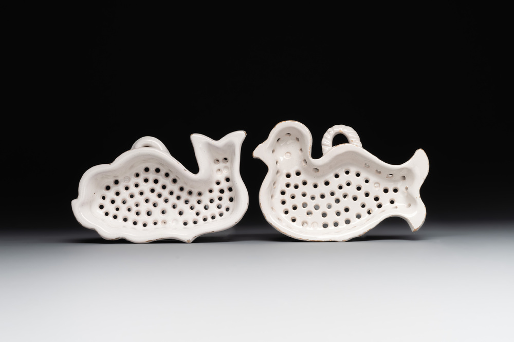 Two white-glazed pottery strainers in the shape of a dove and a whale, France, 18th C.