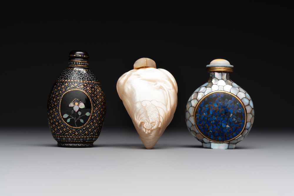 Two Chinese lacquered and mother-of-pearl-inlaid snuff bottles and a carved mother-of-pearl shell snuff bottle, Qianlong mark, 18/19th C