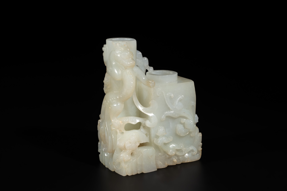 A Chinese white jade 'dragon' ink container with Qianlong mark and possibly of the period