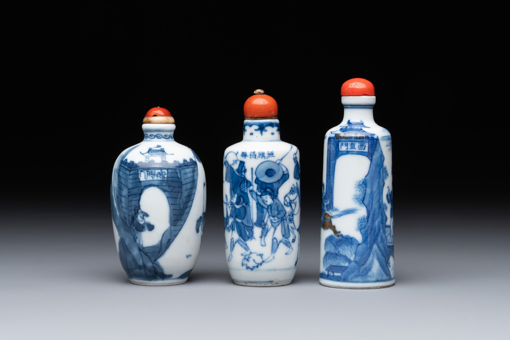 Two Chinese blue and white snuff bottles and a blue, white and copper-red snuff bottle, Yongzheng mark, 19th C.