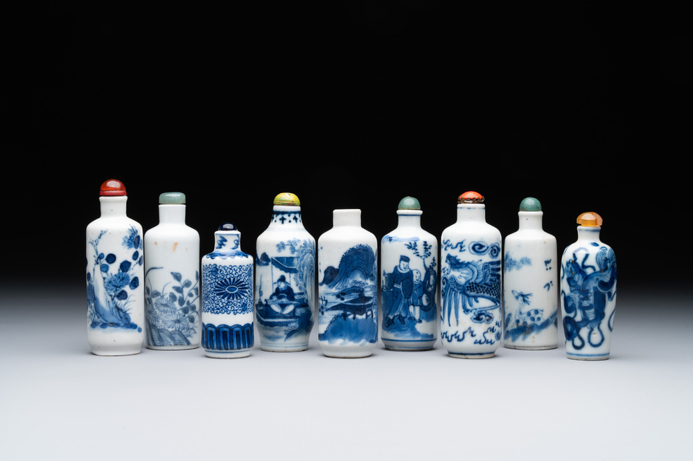 Nine Chinese blue and white snuff bottles, Kangxi and Qianlong mark, 19th C.