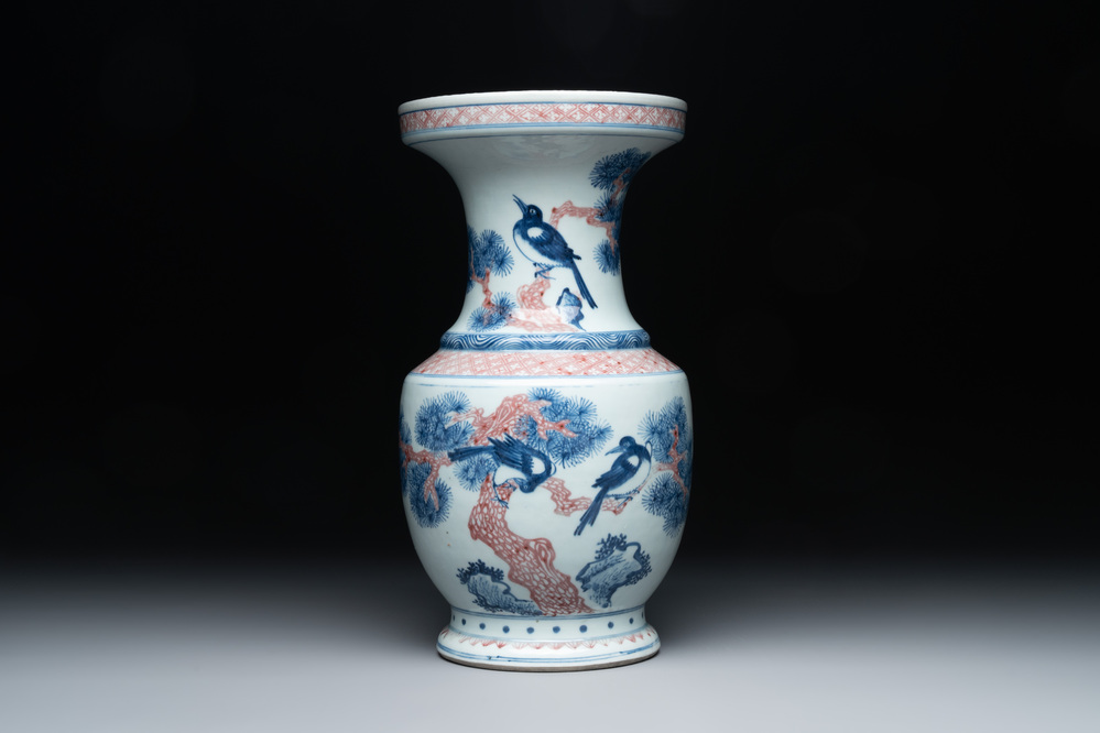 A fine Chinese blue, white and copper-red 'magpie and pine tree' vase, Yongzheng/Qianlong