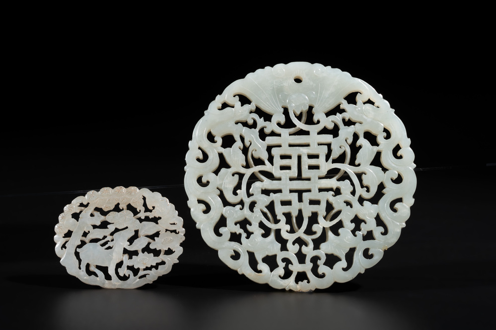 Two Chinese white jade plaques with deer, bat and double happiness design, 19th C.