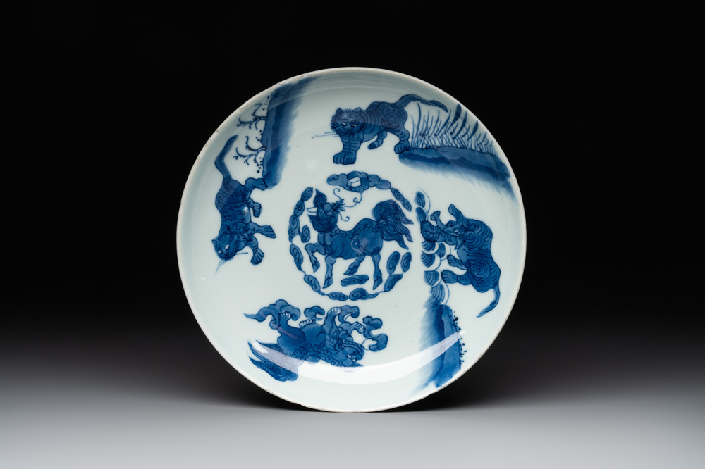 A Chinese blue and white 'mythical beasts' plate, Shunzhi mark and of the period