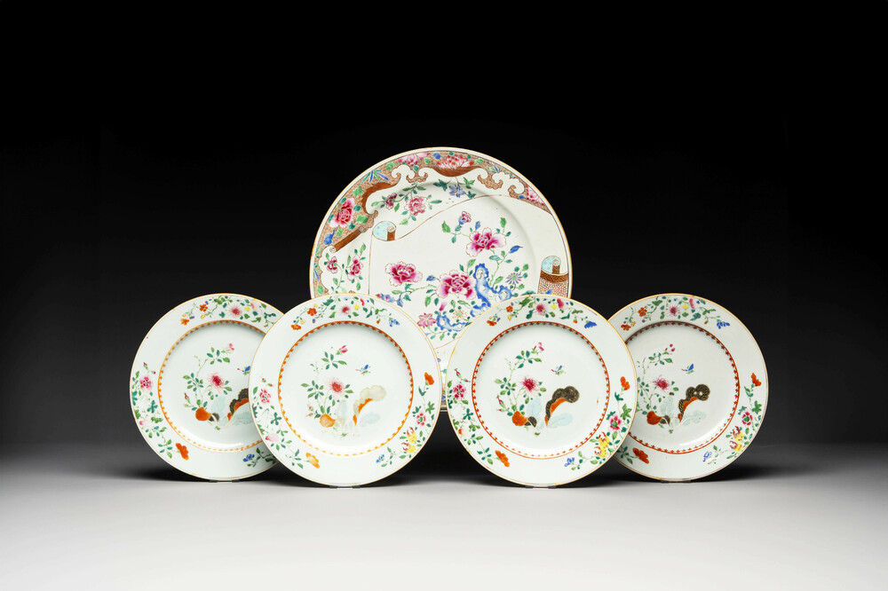 A Chinese famille rose dish and four plates with floral design, Qianlong