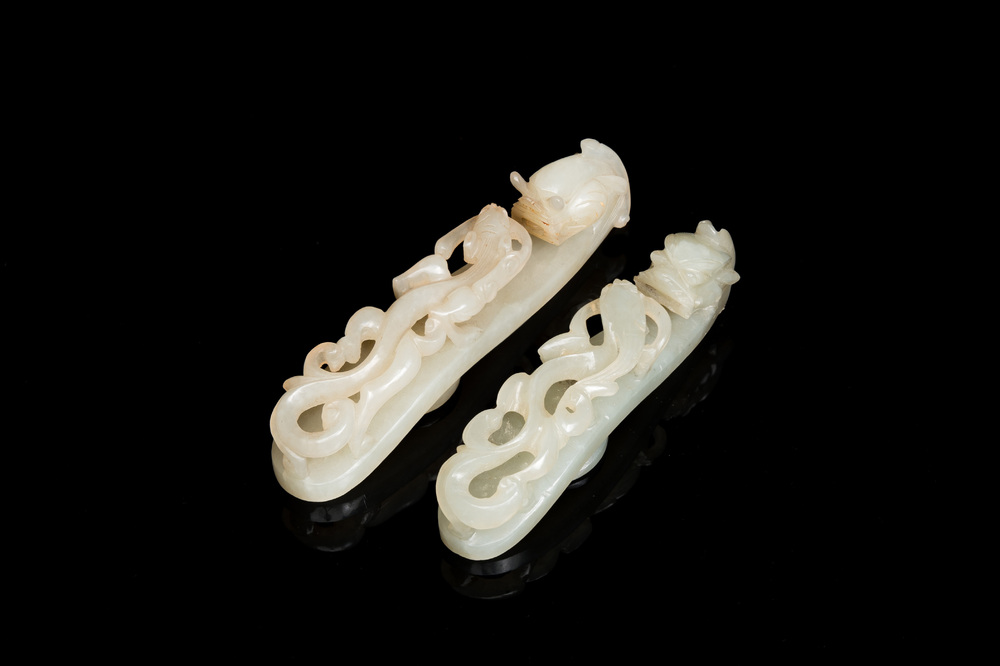 Two fine Chinese white jade carved belt hooks, Qing