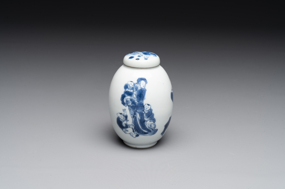 A Chinese blue and white tea caddy and cover with a lady and playing boys, Kangxi