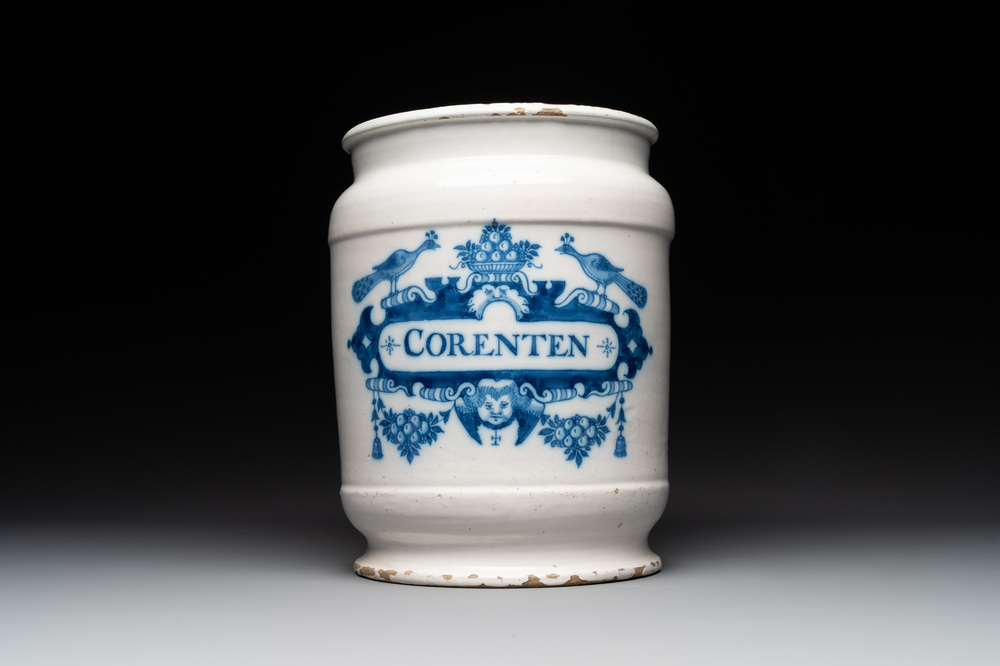A large Dutch Delft blue and white albarello, inscribed 'Corenten', 18th C.