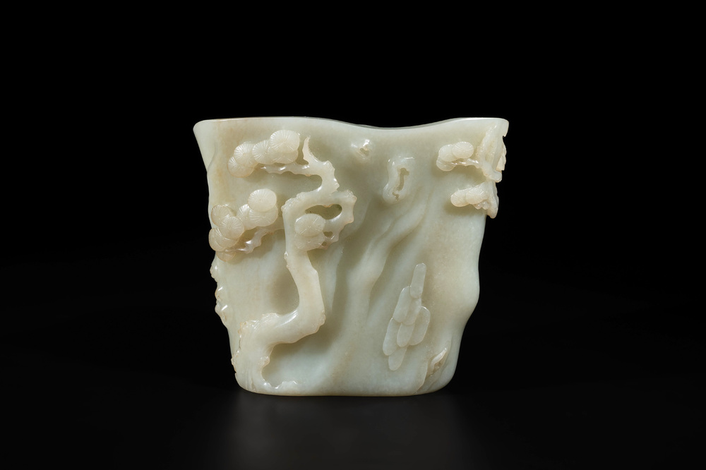 A Chinese white jade 'pine tree' brush pot, Qianlong