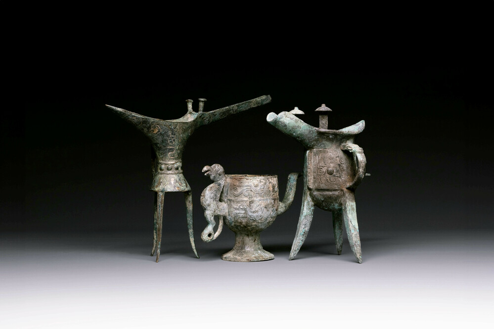 Three Chinese archaic bronze wine vessels, Zhou or later