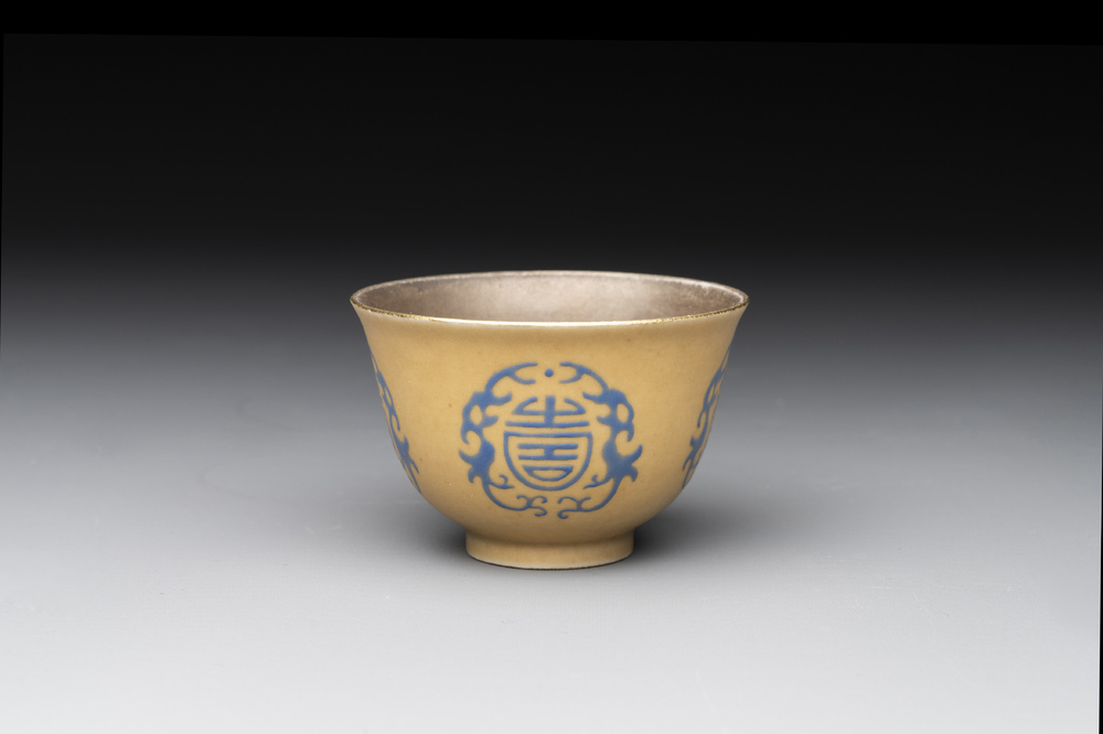 A Chinese blue enamel on gilt &lsquo;Shou&rsquo; cup, 19th C.
