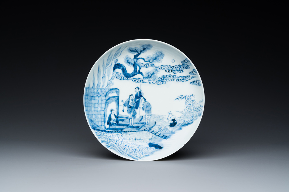 A Chinese blue and white plate with a breastfeeding woman and fishermen on boats, Yongzheng