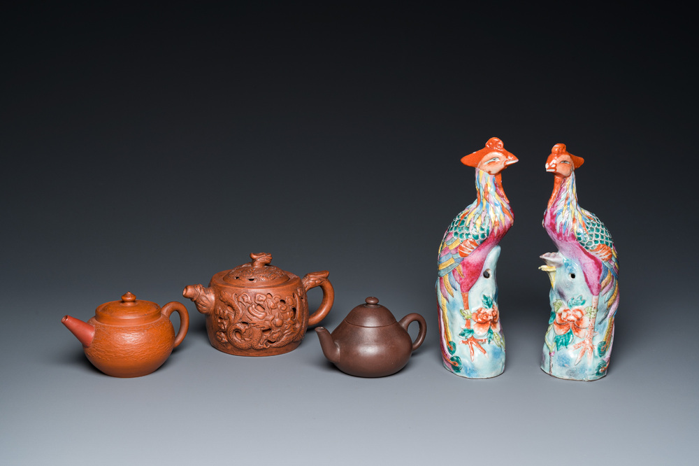 Three Chinese Yixing stoneware teapots and a pair of famille rose phoenixes, 19/20th C.