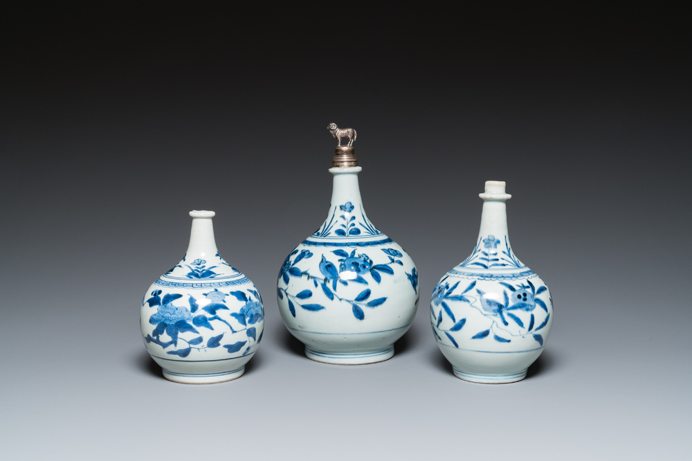 Three Japanese blue and white Arita 'birds among flowering branches' pharmacy bottles, Edo, 18th C.