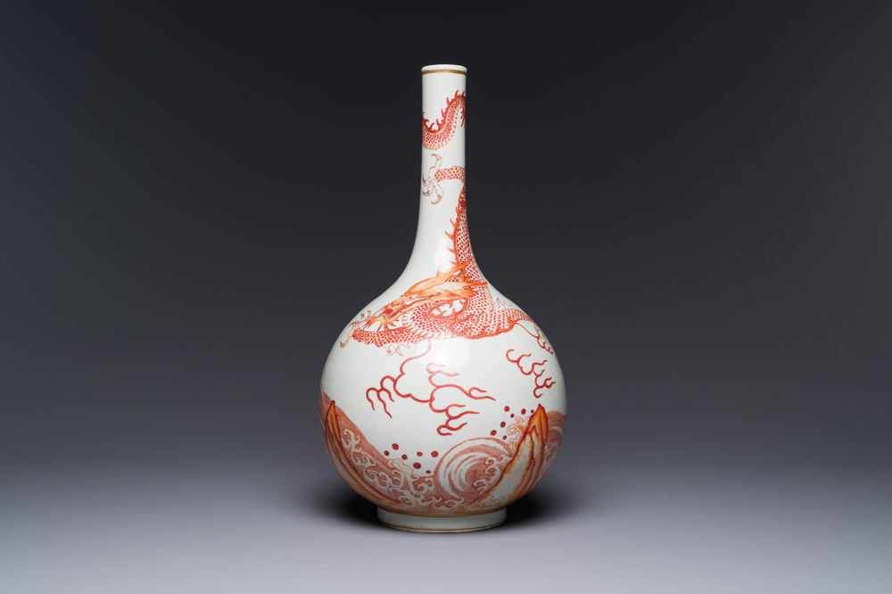 A Chinese iron-red gilt-decorated 'dragon and carp' bottle vase, 19/20th C.