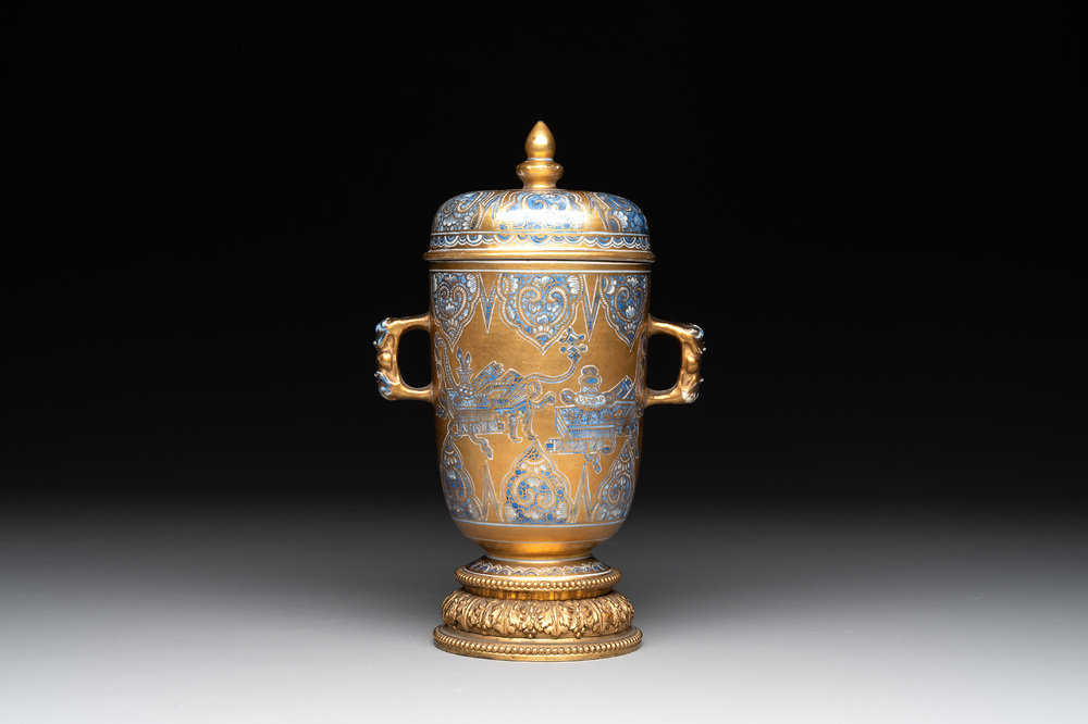 A Chinese gilt-ground blue and white lidded beaker on a French gilt bronze foot, Kangxi