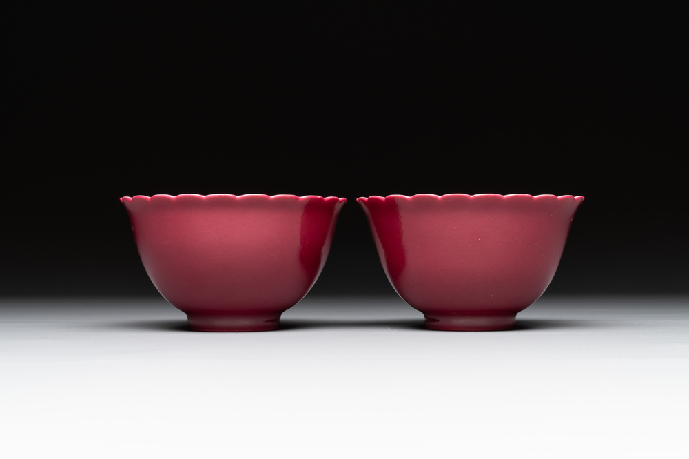 A pair of Chinese ruby-glazed bowls, Qianlong mark, 19/20th C.