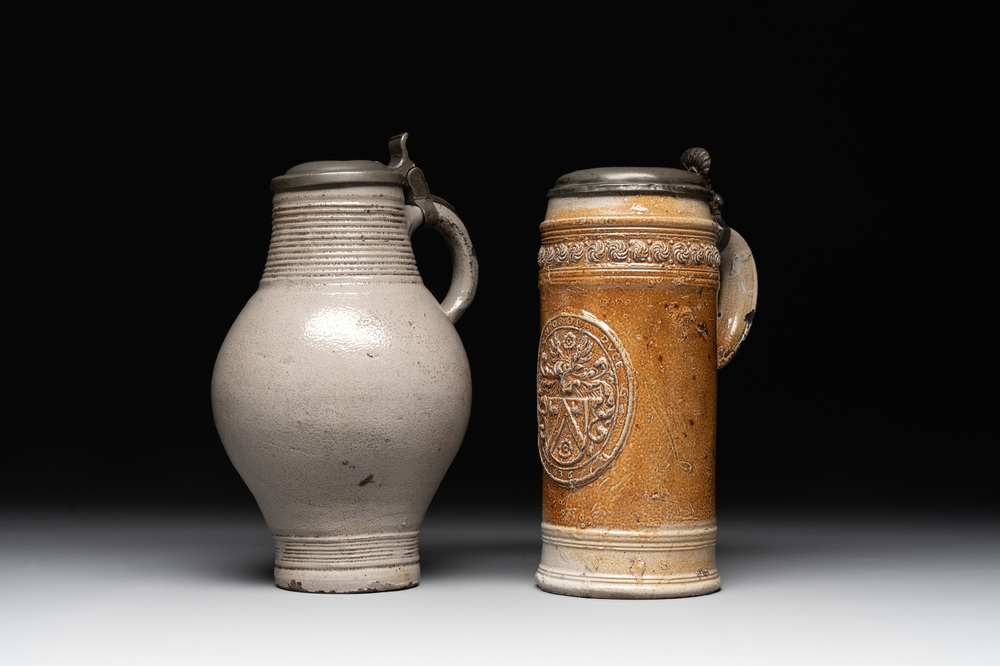 Two stoneware jugs with pewter lids, one with a coat of arms and dated 1636, Germany, 17th C.