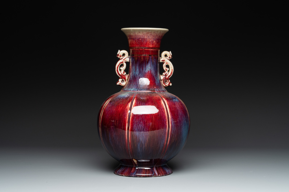 A Chinese flamb&eacute;-glazed vase with archaistic dragon handles, 19th C.