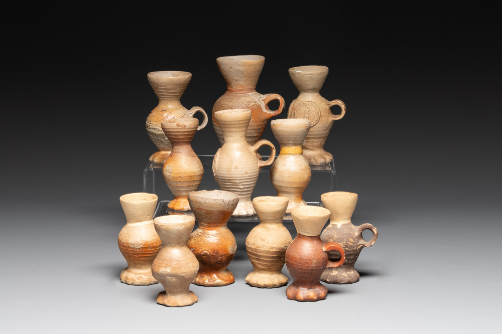 Twelve Siegburg stoneware funnel beakers, 15/16th C.