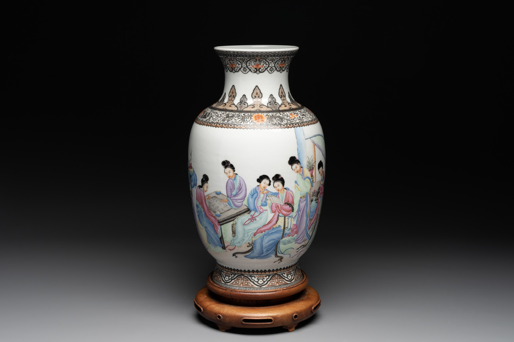 A Chinese famille rose vase with ladies on wooden stand, Qianlong mark, Republic