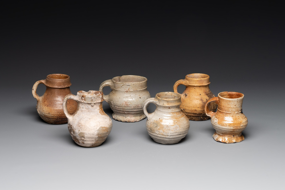 A collection of six German stoneware mugs, 16/17th C.