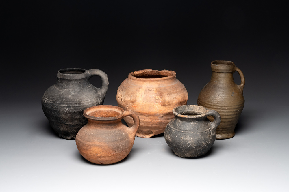 A collection of five German proto stoneware jugs and a vessel, 14th C.