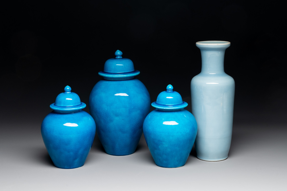 Three Chinese turquoise-glazed covered vases and a lavender-blue-glazed vase, Kangxi mark, 19/20th C.