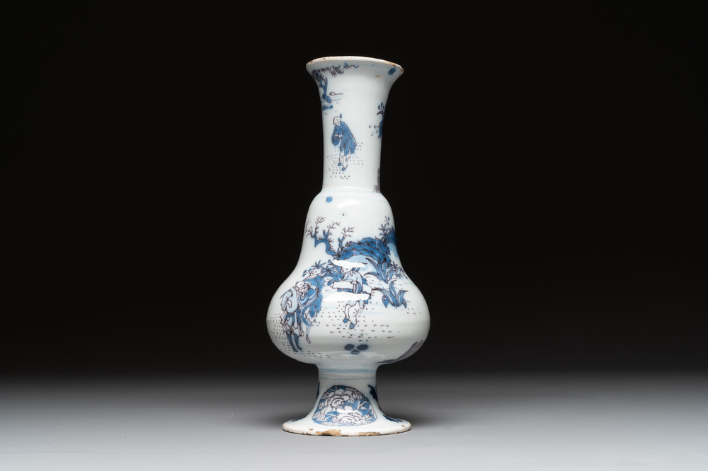 A Dutch Delft blue, white and manganese pear-shaped chinoiserie vase, late 17th C.
