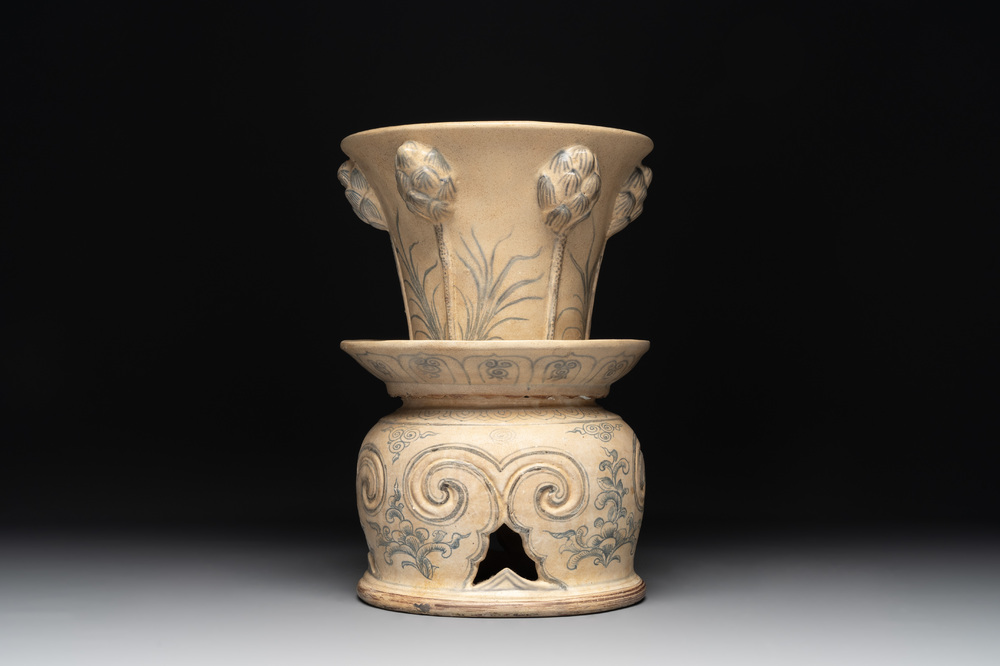 A rare Vietnamese or Annamese reticulated blue and white lotus vessel, 15/16th C.