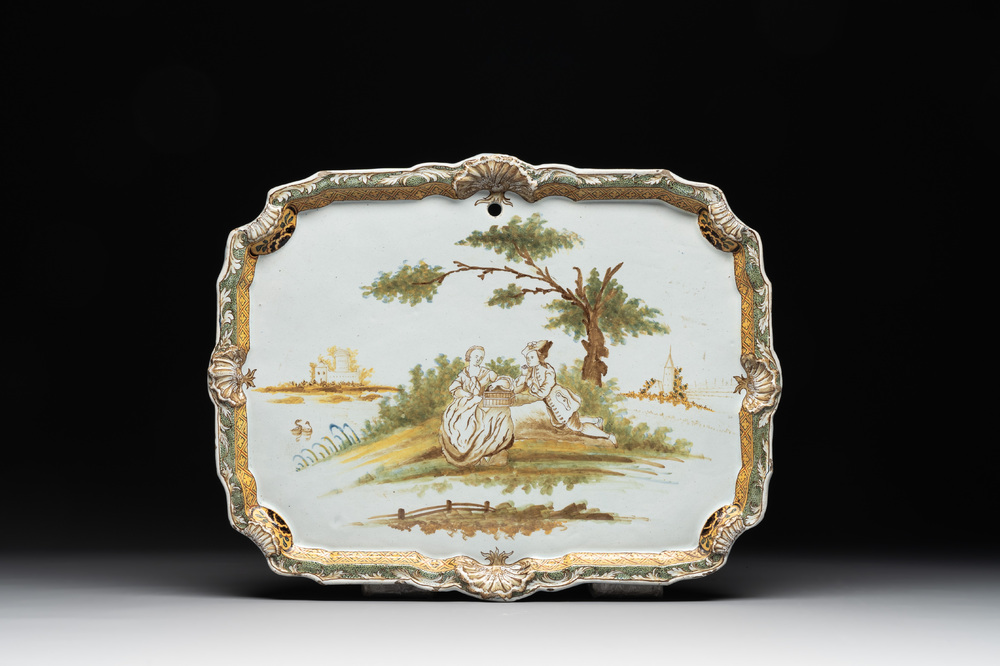 A polychrome Dutch Delft 'pastoral subject' plaque, 18th C.