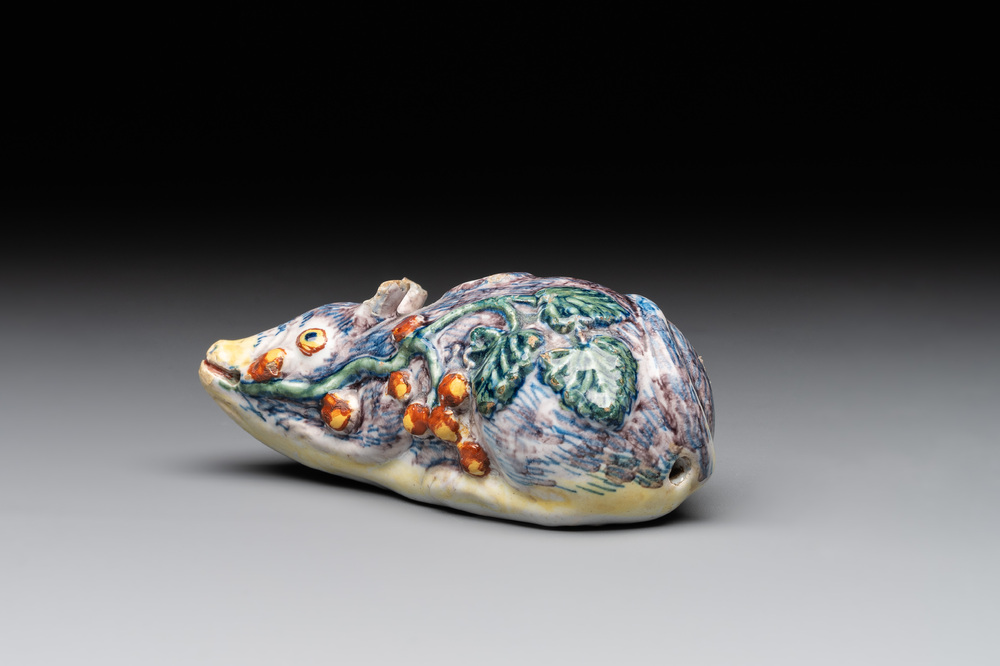 A polychrome Dutch Delft model of a squirrel, 18th C.