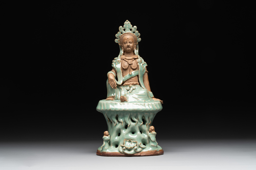 A Chinese Longquan celadon Guanyin, Ming or later