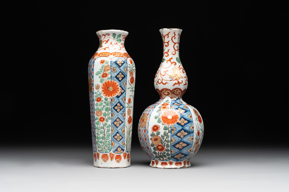 Two polychrome Dutch Delft petit feu vases with floral design, early 18th C.