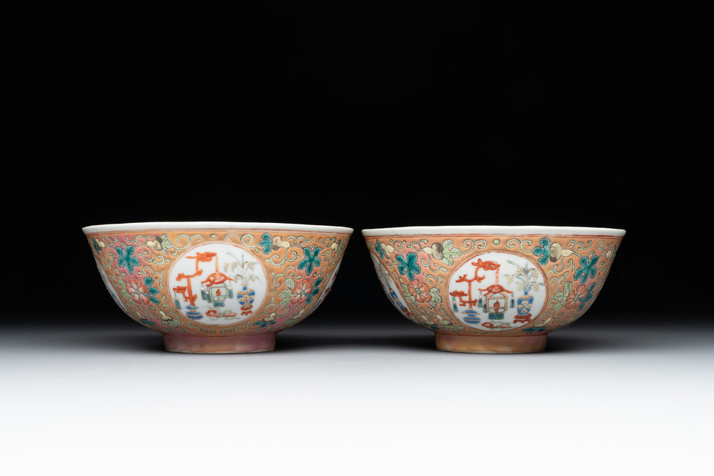 A pair of Chinese famille rose pink-ground 'antiquities' bowls, Zhengde mark, 19th C.