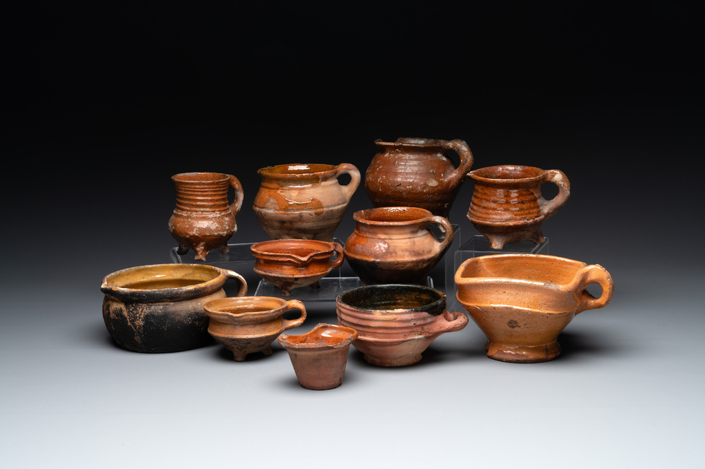 11 brown-glazed pottery wares, Low Countries, 14/17th C.